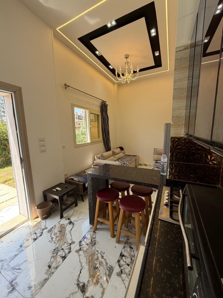 Marina 4 Prime Duplex: 2BR, Private Garden, Steps from the Lagoon & Beach