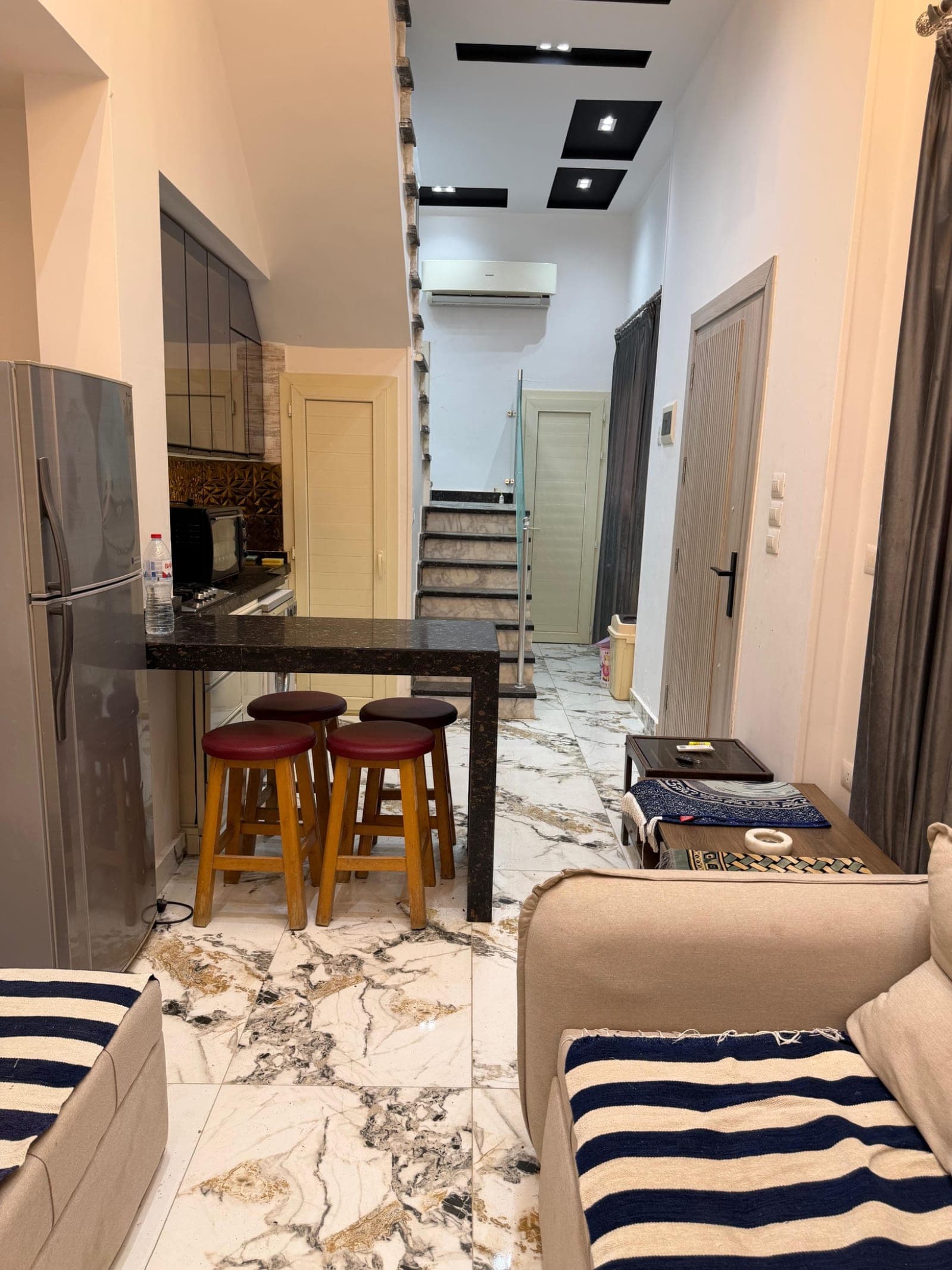 Marina 4 Prime Duplex: 2BR, Private Garden, Steps from the Lagoon & Beach
