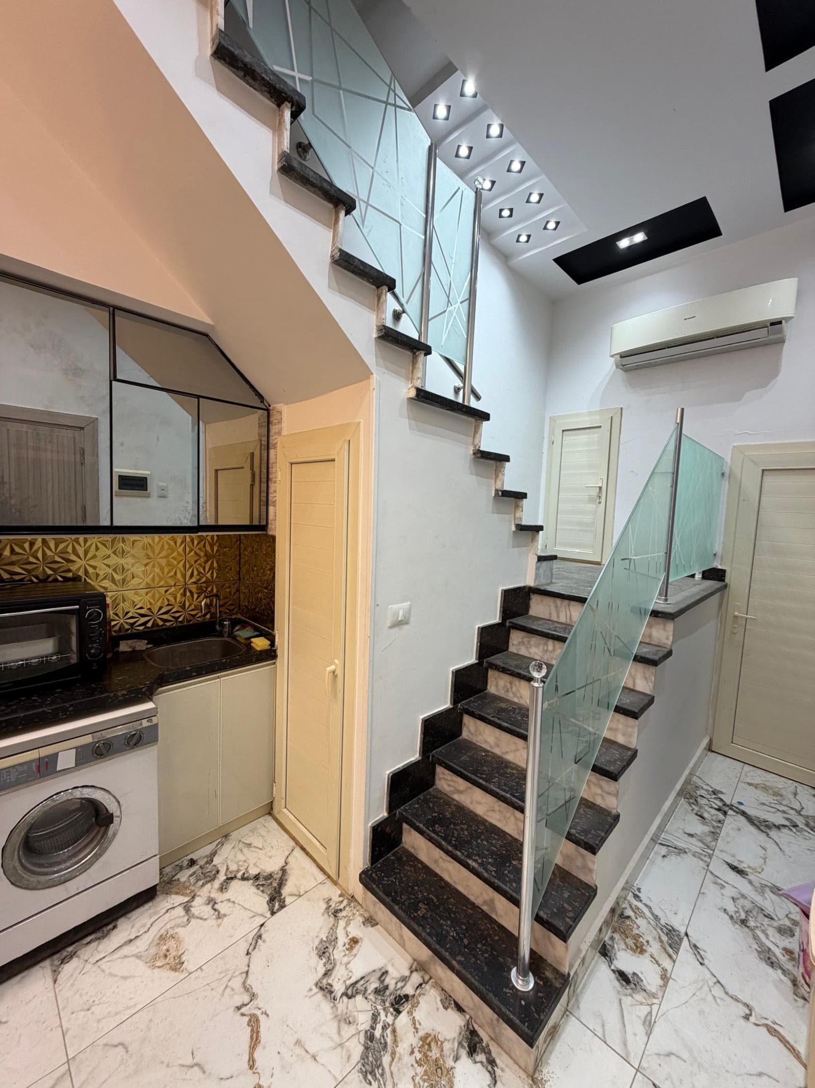 Marina 4 Prime Duplex: 2BR, Private Garden, Steps from the Lagoon & Beach