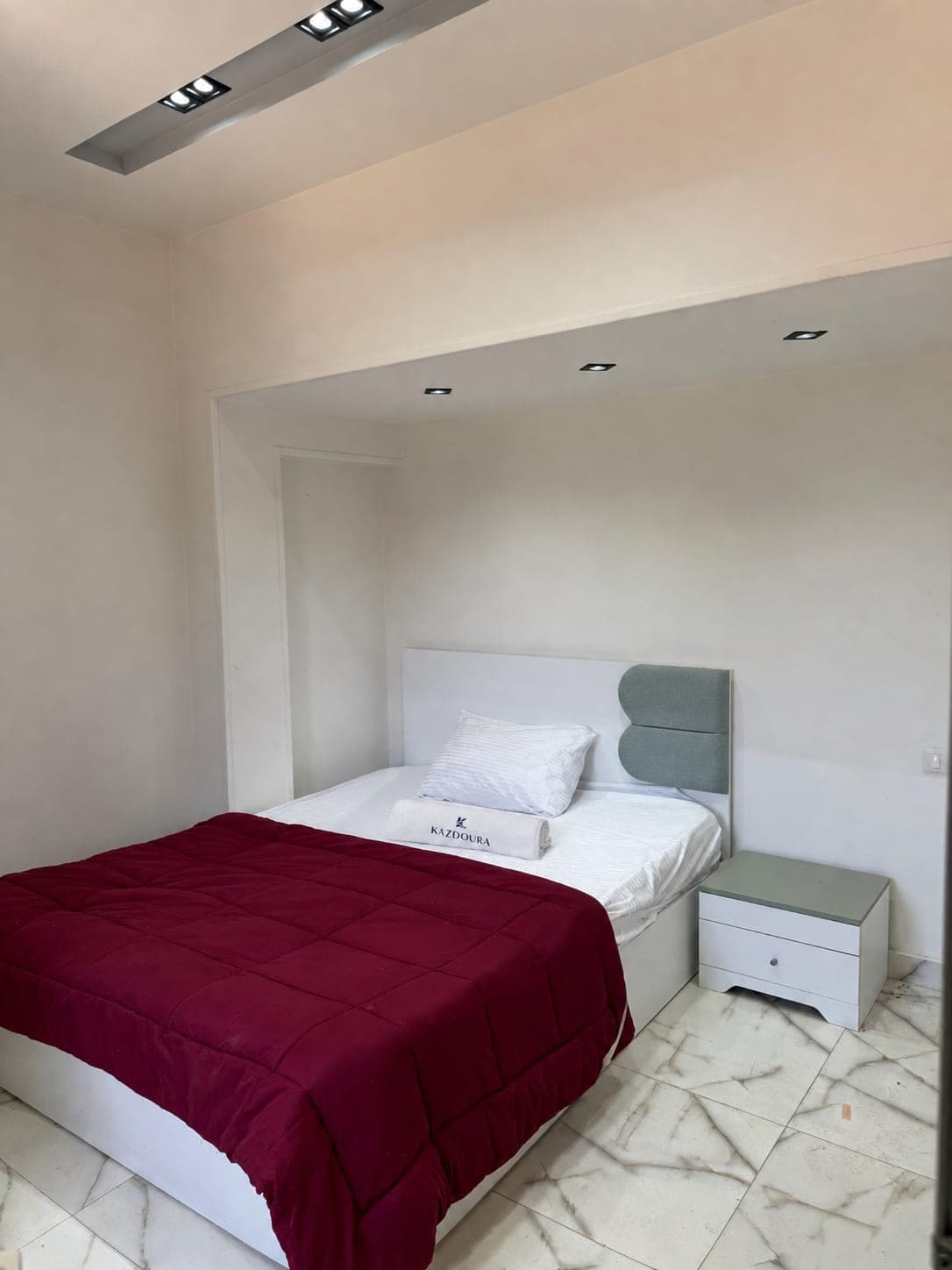 Marina 4 Prime Duplex: 2BR, Private Garden, Steps from the Lagoon & Beach